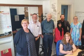 Dame Clare Moriarty, second right, pictured with trustees, volunteers and staff at the Aylesbury advice centre