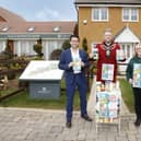 Aylesbury Mayor Tim Dixon, centre, with Marc Woolfe, head of sales at Barratt David Wilson North Thames, and Aylesbury Foodbank volunteer Sherrilyn Bateman