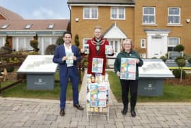 Aylesbury Mayor Tim Dixon, centre, with Marc Woolfe, head of sales at Barratt David Wilson North Thames, and Aylesbury Foodbank volunteer Sherrilyn Bateman