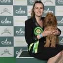 Antonia Leech, from Milton Keynes, with Margaux, a Basset Fauve de Bretagne which was the Best of Breed winner on the first day of Crufts 2025. Photo: BeatMedia / The Royal Kennel Club