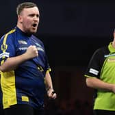 Luke Littler celebrates during darts' world final against Michael van Gerwen. Picture by Taylor Lanning/PDC.