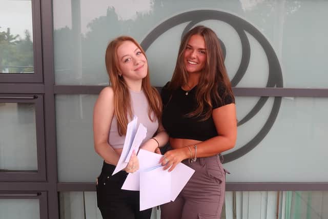Lily-Mae Cross and Natasha Hunt collect their A-level results at The Buckingham School