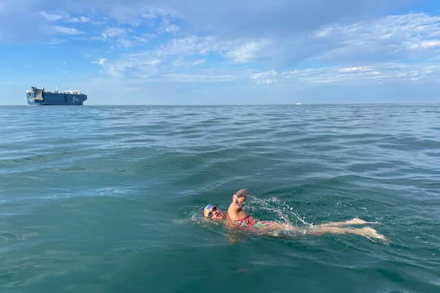 Melanie swimming in the channel