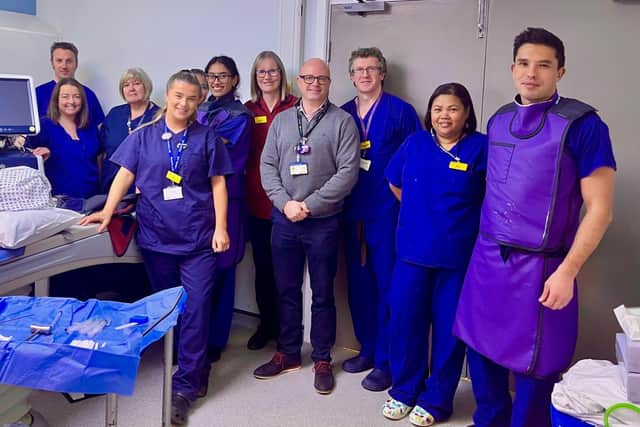 Dr David McKean, far right, and his team
