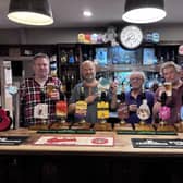 (left to right) Carl Griffin (CAMRA Buckinghamshire Clubs Coordinator), Ian Matthews (Licensee, the Hop Pole), Elvis Evans (branch deputy chair), Mike Clarke (branch chair).