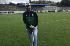 Aylesbury United director Andy Martin attempts to get the pitch playable. Photo: AUFC.