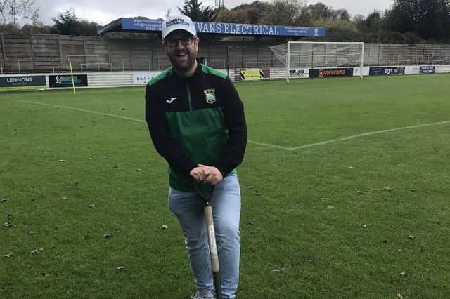 Aylesbury United director Andy Martin attempts to get the pitch playable. Photo: AUFC.