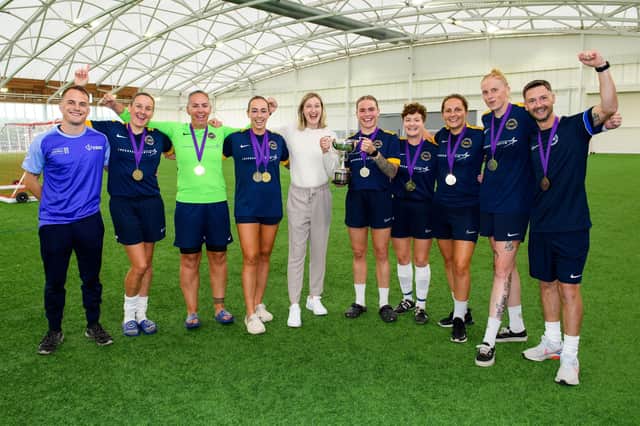 Aylesbury Lioness Ellen White celebrates with the winning Royal Navy team at the inaugural Public Sector Women's Football Tournament