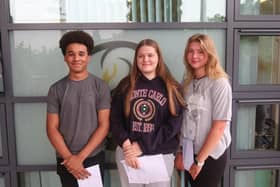 Students Seth Mmanga, Lauren Combe and Sophie Johnson