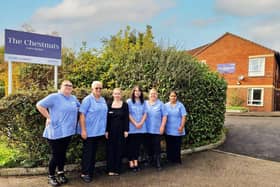 The Chestnuts Care Home Manager Laura Williams with members of her team outside the home on Lavric Road in Aylesbury.