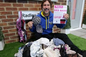 Bucks Radio presenter Wes Venn with some of the bras that have been collected