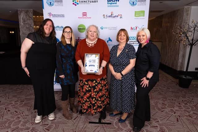 Council team members pick up their silver award
