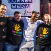 Linus Udofia (centre, in white) - pictured last year at a Pegasus charity event - will be fighting for the British Middleweight title on Friday, May 13
