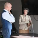 Firaz (centre right) met The Princess Royal ahead of his award win. Also pictured is Spinal Injuries Association's CEO, Nik Hartley OBE (left)