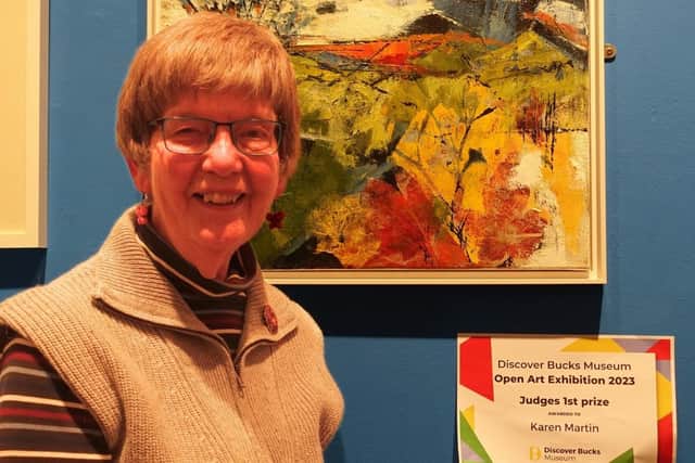First prize winner Karen Martin with her painting, 'Promise of Summer'