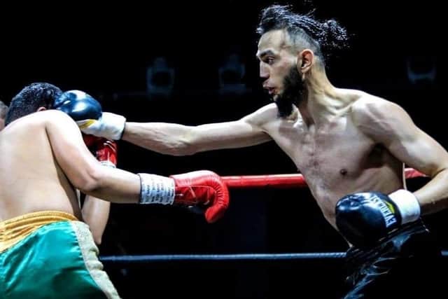 Izzadeen Malik El-Amin wants to be a Champ in and outside the boxing ring
