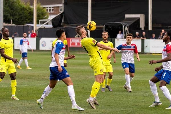 Goalscorer James Armson in action during Brackley Town's 1-1 draw at AFC Rushden & Diamonds. Picture by Glenn Alcock