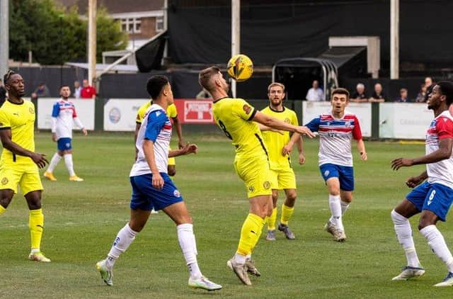 Goalscorer James Armson in action during Brackley Town's 1-1 draw at AFC Rushden & Diamonds. Picture by Glenn Alcock