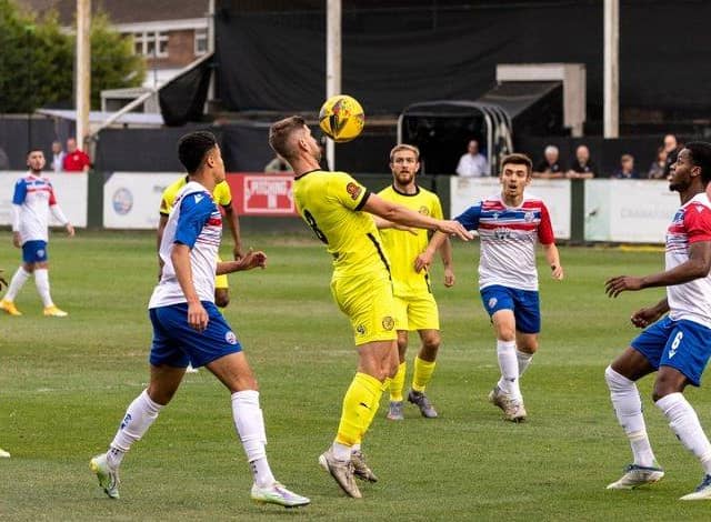 Goalscorer James Armson in action during Brackley Town's 1-1 draw at AFC Rushden & Diamonds. Picture by Glenn Alcock