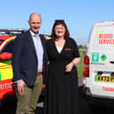 Air ambulance CEO Amanda McLean takes delivery of the new electric blood van from Steve Jones of LeasePlan UK