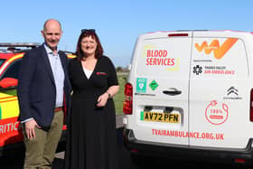 Air ambulance CEO Amanda McLean takes delivery of the new electric blood van from Steve Jones of LeasePlan UK