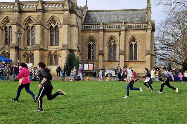 Pancake races on St Peter & St Paul's Church Green.