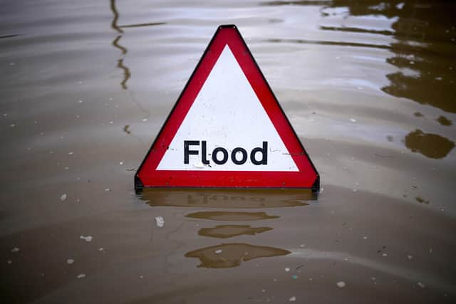 A flood warning sign deployed in England this morning. (Photo by Christopher Furlong/Getty Images)