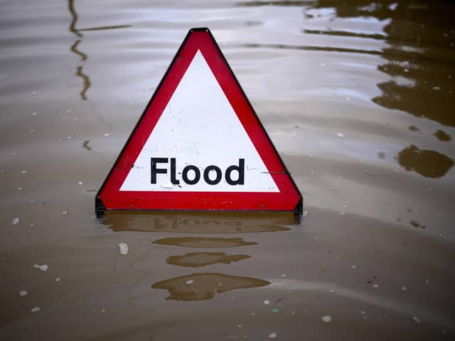 A flood warning sign deployed in England this morning. (Photo by Christopher Furlong/Getty Images)