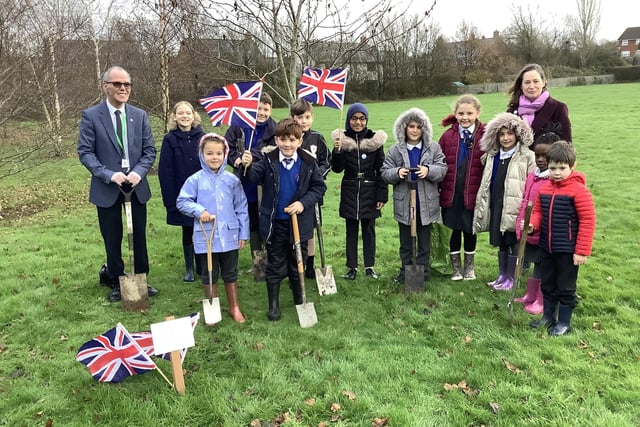 The junior leadership team with Cllr Frank Mahon, ready to plant a tree for The Queen's Green Canopy