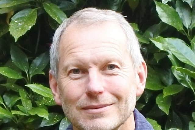Cllr. Russell Poppe