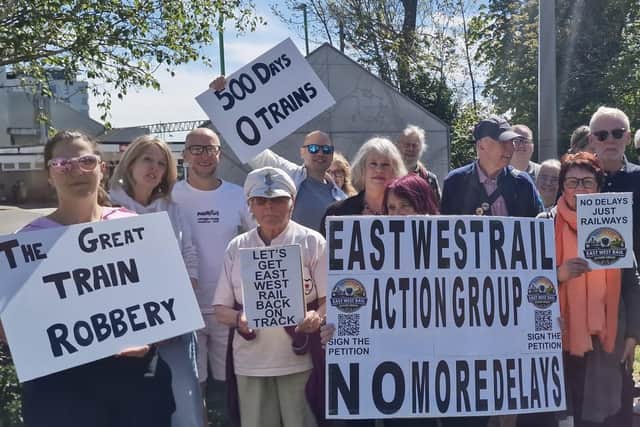 Members of the East West Rail Action Group during a previous protest outside Bletchley Station