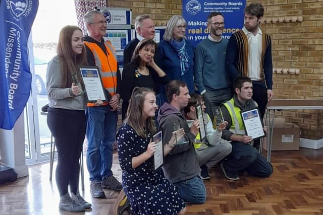 Kelsie Wright and other winners receive their Proud of Bucks awards