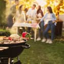 Group of friends having party outdoors. Photo: New Africa  stock.adobe.com