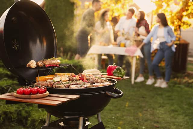 Group of friends having party outdoors. Photo: New Africa stock.adobe.com