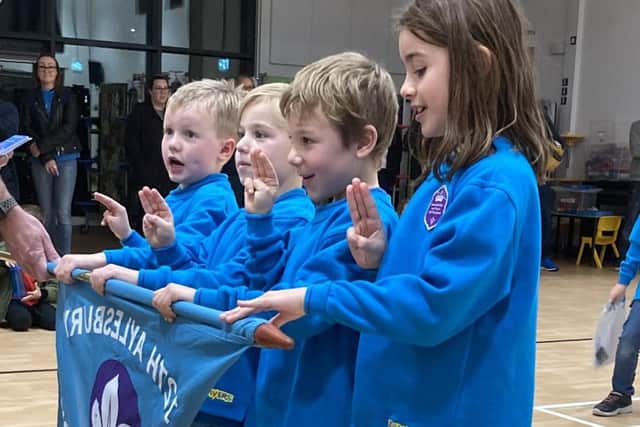 Four children recently invested as Beaver Scouts