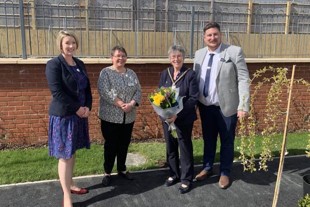 Mayor of Buckingham Margaret Gateley and, from left, home manager Claire Gascoigne, regional director Eileen Ward and customer relations manager Steve Ward (Customer Relations Manager with the newly planted tree at Lace Hill Manor