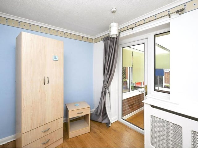 The second bedroom is smaller than the main, but it is still a double and has room for a wardrobe. It also has access to the conservatory.
