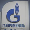 The logo of Russia's energy giant Gazprom is pictured at one of its petrol stations in Moscow (Photo by NATALIA KOLESNIKOVA/AFP via Getty Images)