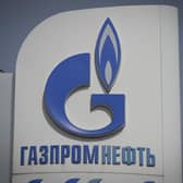 The logo of Russia's energy giant Gazprom is pictured at one of its petrol stations in Moscow (Photo by NATALIA KOLESNIKOVA/AFP via Getty Images)