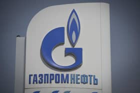 The logo of Russia's energy giant Gazprom is pictured at one of its petrol stations in Moscow (Photo by NATALIA KOLESNIKOVA/AFP via Getty Images)