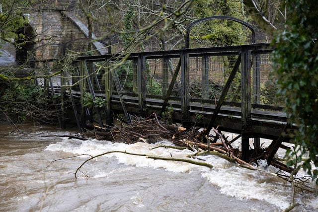 Debris collects under a bridge over the River Derwent in Matlock Bath.