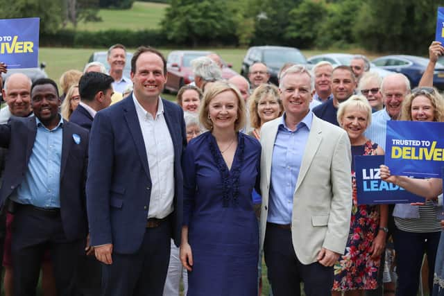 Liz Truss with MPs Greg Smith and Rob Butler