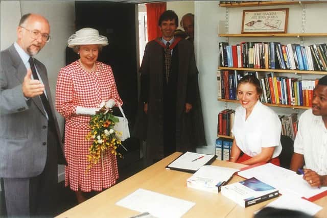 Elizabeth II receiving a tour of the University of Buckingham