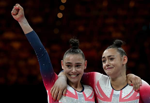 Jessica Gadirova (L) is hugged by her twin sister Jennifer after winning the Women's Floor Exercise Final at the European Artistic Gymnastics Championships in Munich. Photo: Getty.
