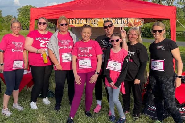 Steph and Claire with members of Steph’s Salvation Army Slimming World group