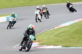 Mervyn Stratford (no.47) leads into a corner at Mallory Park.