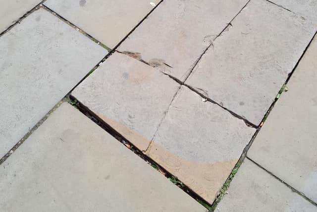 Cracked paving slab