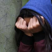 PICTURE POSED BY MODEL of a teenage girl with her head in her hands showing signs of mental health issues. PA Photo.Photo from: Gareth Fuller/PA Wire