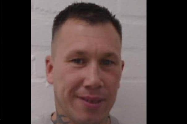 Darren Burdfield is wanted by the police