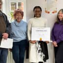 Competition winner Hortence with the judges and organiser of the competition